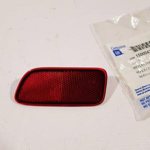 Катафот/Светоотражатель заднего бампера левый Chevrolet TrailBlazer 2001-2009 General Motors 15000427 Катафот/Светоотражатель заднего бампера левый Chevrolet TrailBlazer 2001-2009 General Motors 15000427