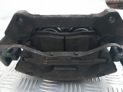 Суппорт тормозной передний левый Ford Expedition 2003-2006 2L1Z 2B121 BA