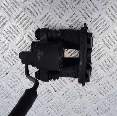 Суппорт тормозной задний левый Ford Expedition 1996-2002 F75Z 2553 BA