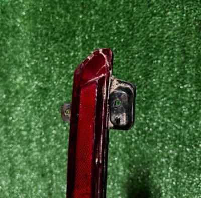 Катафот/Светоотражатель заднего бампера левый (дефект) Cadillac Escalade 2015-2019 84240626 ; 22803024