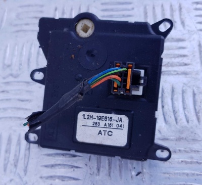 Моторчик заслонки отопителя Lincoln Aviator 2002-2005 F7DZ 19E616 BA; 1L2H 19E616 JA