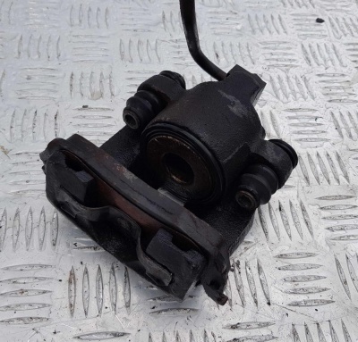 Суппорт тормозной задний левый Ford Expedition 1996-2002 F75Z 2553 BA