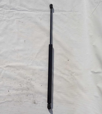 Амортизатор двери багажника левый Chevrolet Tahoe 1999-2006 15766375; 15746119