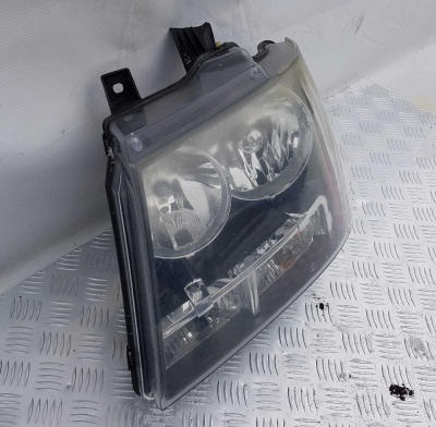Фара передняя левая (с дефектом) Chevrolet Tahoe 2006-2014 22853025; 20760578; 15950807; 15882877; 15853252; 15820048; 15819693; 15200040; 15863394; 15895612