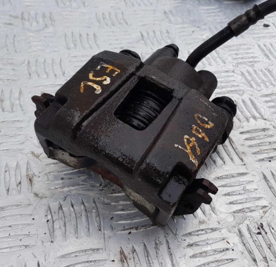 Суппорт тормозной задний левый Ford Escape 2000-2012 6L8Z 2553 A