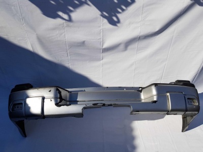 Бампер задний Chevrolet TrailBlazer 1 89045604; 88937016