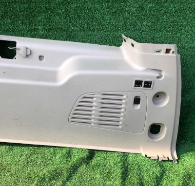 Обшивка багажника правая Cadillac Escalade (ESV) 2015-2020 23221259