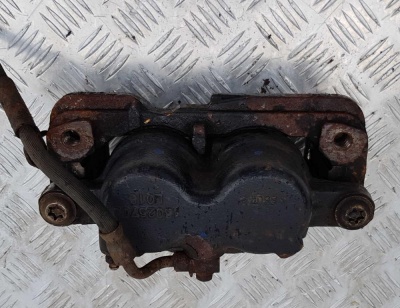 Суппорт тормозной передний левый Chevrolet Tahoe 1999-2006 18025700; 25848001; 19331022