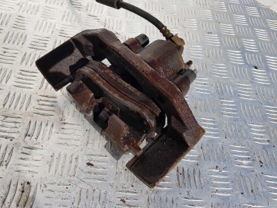 Суппорт тормозной задний левый Lincoln Navigator / Expedition 2007-2017 7L1Z 2553 B;